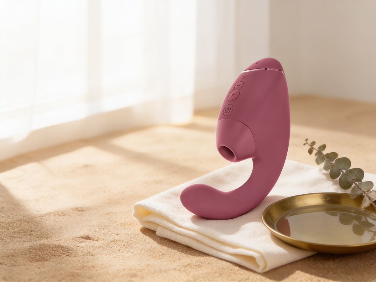 Stimulator Womanizer DUO Next roz, cu unde de aer, pe in crem